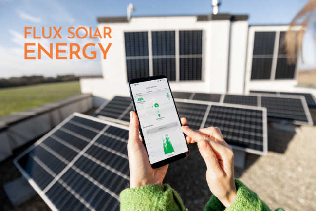 Solar Power Stock Image - Flux Solar Energy Solar Power on the roof and showing savings on the app
